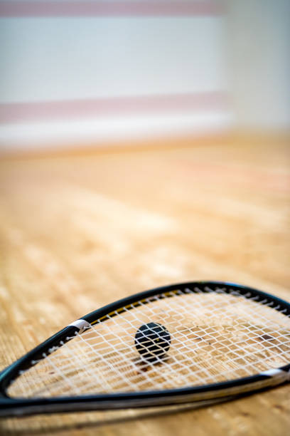 Racquet and squash ball