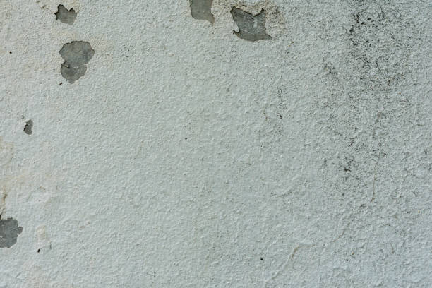 istock Wall fragment with scratches and cracks 1006588132
