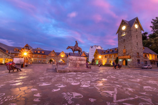 Civic Center (Centro Civico) and main square in downtown Bariloche at sunset - Bariloche, Patagonia, Argentina Civic Center (Centro Civico) and main square in downtown Bariloche at sunset - Bariloche, Patagonia, Argentina nahuel huapi national park stock pictures, royalty-free photos & images