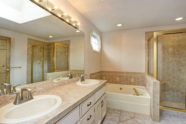istock Master Bathroom with double vanity cabinet and shower. 1006597488