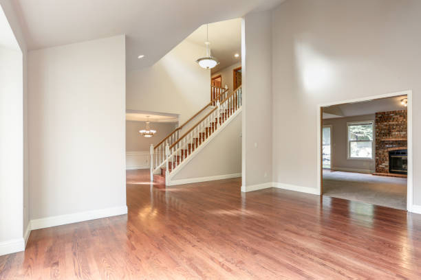 istock Empty entrance room with staircase. 1006598186