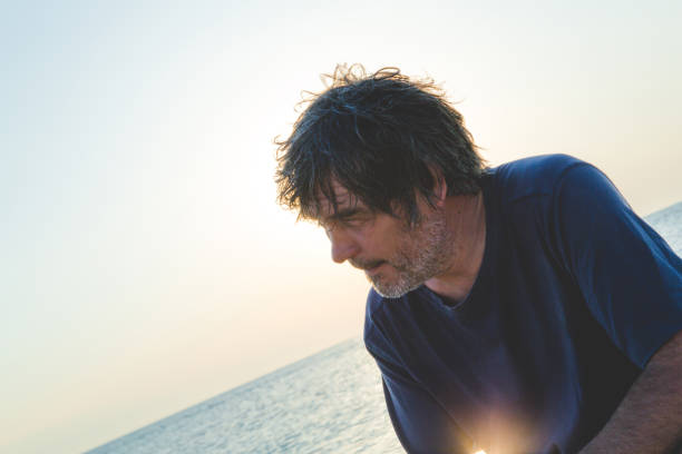 istock Handsome man with a faraway look 1006607108