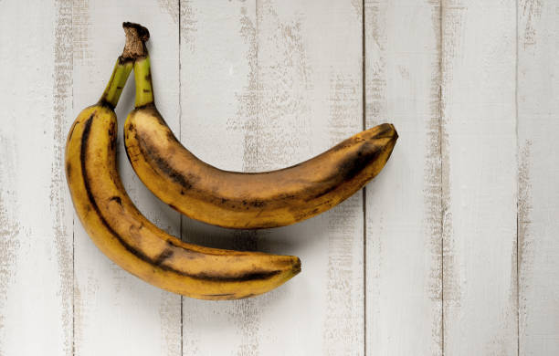istock ripe bananas on wood 1006628900