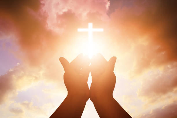 istock Christian man with open hands worship christian. Eucharist Therapy Bless God Helping Repent Catholic Easter Lent Mind Pray. Christian concept background. 1006629450