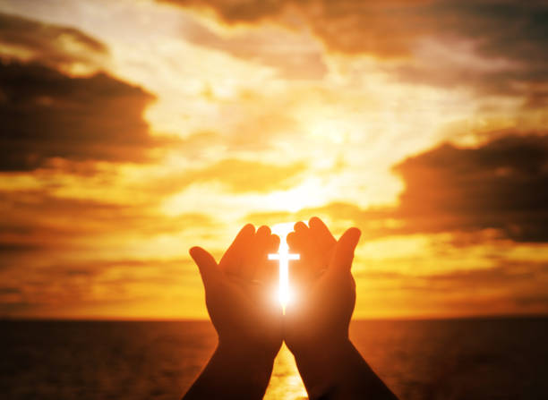 istock Christian man with open hands worship christian. Eucharist Therapy Bless God Helping Repent Catholic Easter Lent Mind Pray. Christian concept background. 1006629490