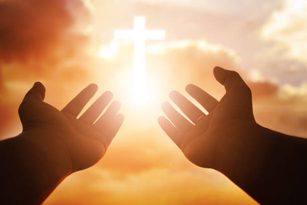 istock Christian man with open hands worship christian. Eucharist Therapy Bless God Helping Repent Catholic Easter Lent Mind Pray. Christian concept background. 1006629528