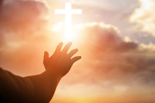 istock Christian man with open hands worship christian. Eucharist Therapy Bless God Helping Repent Catholic Easter Lent Mind Pray. Christian concept background. 1006629534