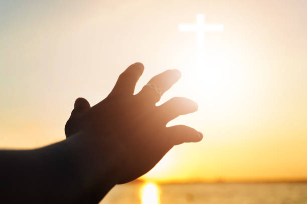 istock Christian man with open hands worship christian. Eucharist Therapy Bless God Helping Repent Catholic Easter Lent Mind Pray. Christian concept background. 1006629610