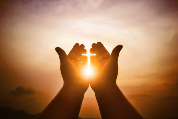 istock Christian man with open hands worship christian. Eucharist Therapy Bless God Helping Repent Catholic Easter Lent Mind Pray. Christian concept background. 1006629812