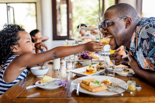 Guests having breakfast at hotel restaurant Guests having breakfast at hotel restaurant breakfast stock pictures, royalty-free photos & images