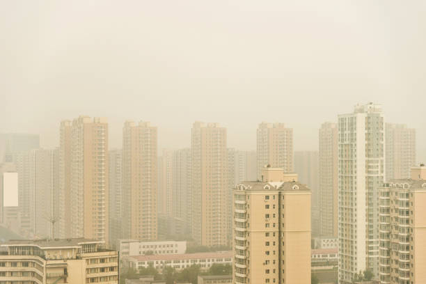 istock Buildings the city covered with fog 1006630976