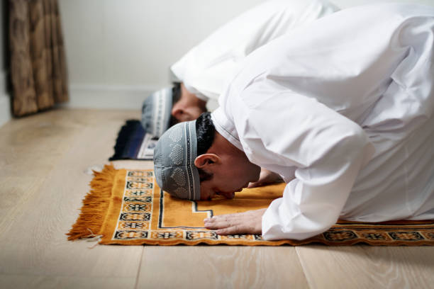 istock Muslim prayers in Sujud posture 1006634312