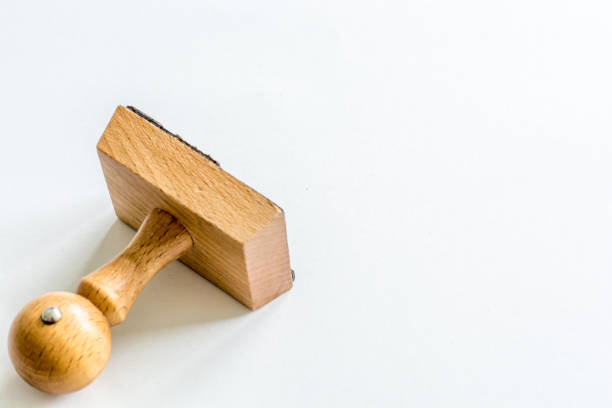 istock Wooden stamp on white background 1006637926
