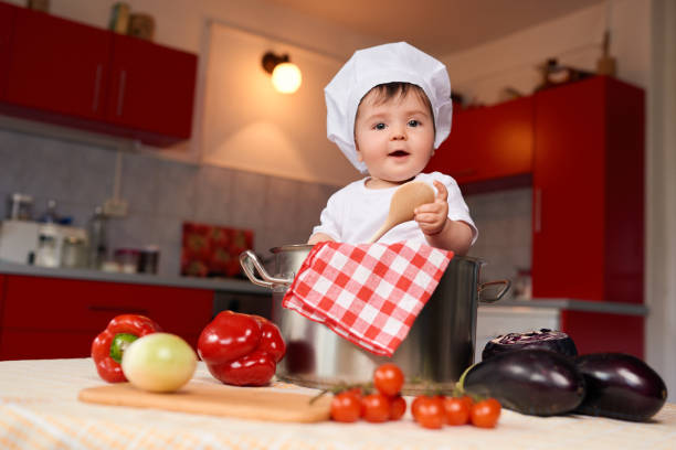 istock funny baby girl inside pot 1006638060