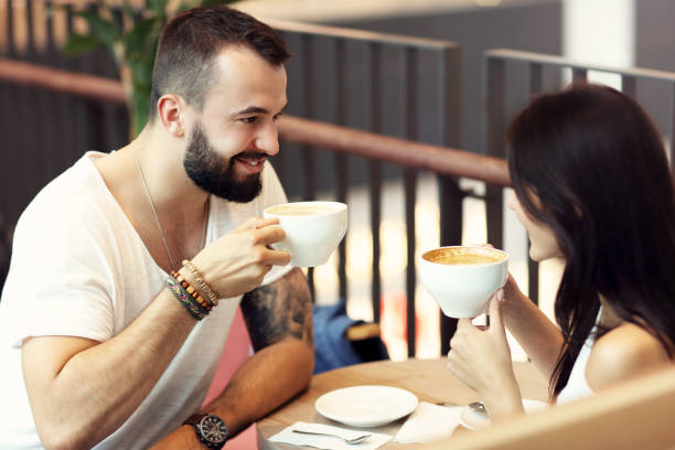 istock Romantic couple dating in cafe 1006641642