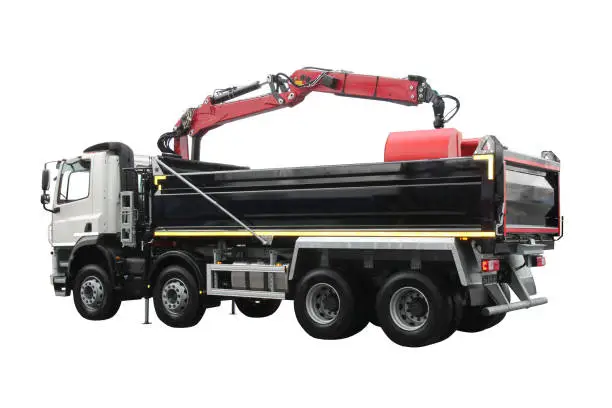 A Modern Large Tipper Lorry with an Hydraulic Grab Arm.