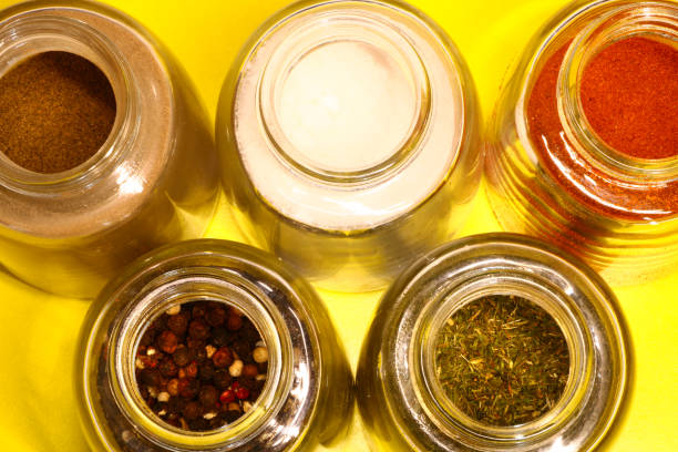 istock spices in a glass jar on a colored background 1006652022