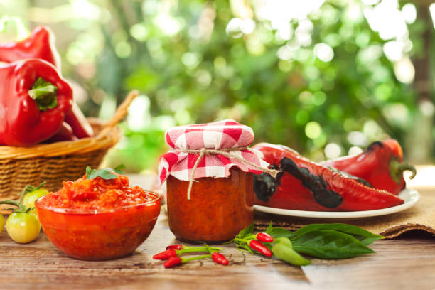 istock Ajvar in a jar and glass bowl 1006652168