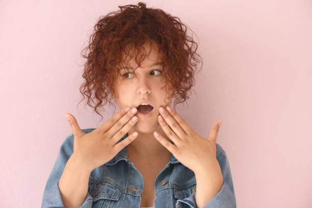 istock Beautiful girl on the pink background 1006653218