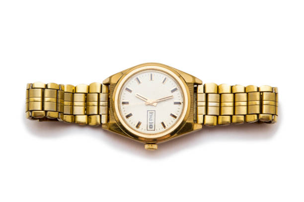 Wrist watch in gold isolated on white background