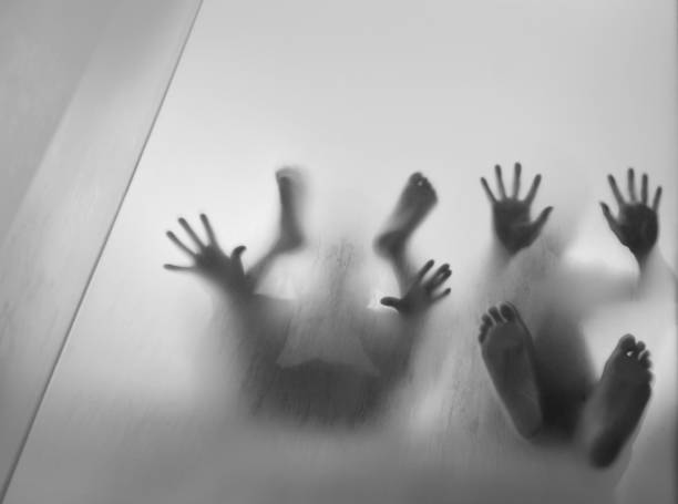 istock Two people are trapping in frosted glass 1006659048