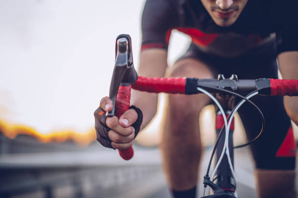 Man cycling outdoors Athlete on racing bike outdoors racing bicycle photos stock pictures, royalty-free photos & images
