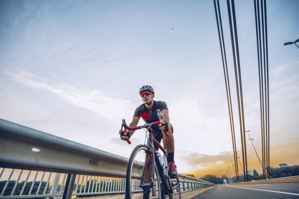 istock Athlete cycling outdoors 1006665684
