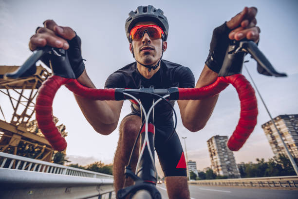 istock Athlete man on racing bike 1006668920