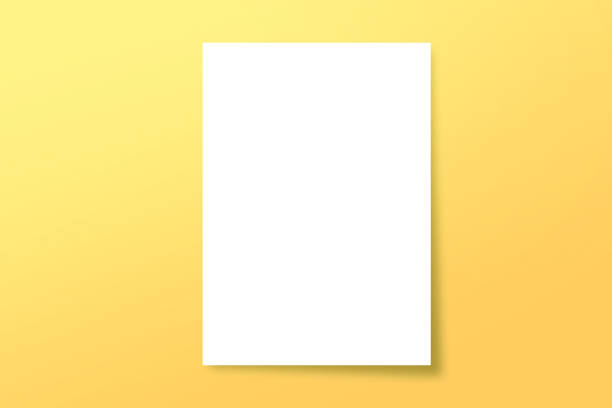 istock Blank A4 paper template on yellow of background. 1006669458