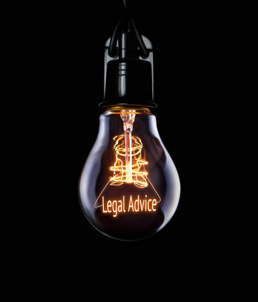 istock Hanging lightbulb with glowing Legal Advice concept. 1006670290