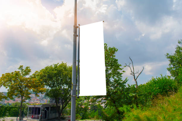 istock Flag blank mockup on a perfect sky with cloudy, blue and sun reflection background 1006671002