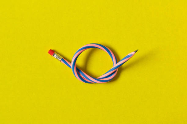 istock Flexible pencil . Isolated on yellow background 1006671060
