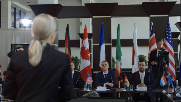 istock Politicians listening to member speech 1006677770