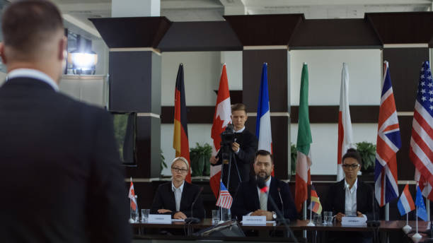 istock Politicians listening to member speech 1006677796