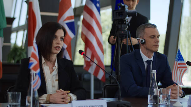 istock Woman talking on politician summit 1006678170