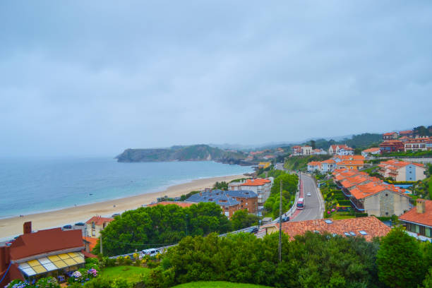 View of beach and town of Comillas from Guell and Martos park. Nice sightseeing. Comillas, Cantabria, Spain View of beach and town of Comillas from Guell and Martos park. Nice sightseeing. Comillas, Cantabria, Spain cantabria stock pictures, royalty-free photos & images