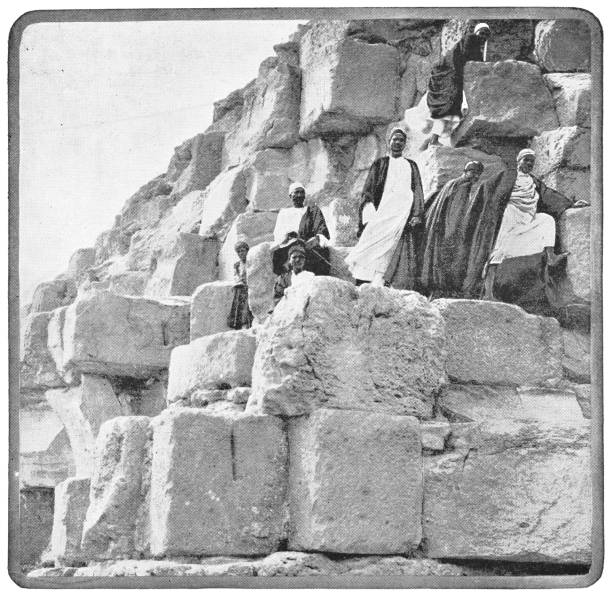 istock Men at the Great Pyramid in Giza, Egypt - Ottoman Empire 1006690876