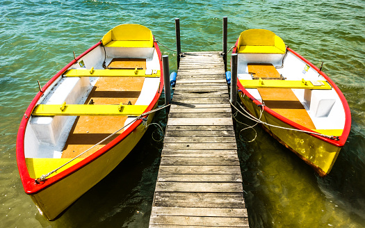 old row boats at a lake