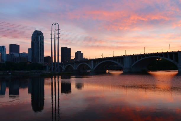 istock Minneapolis cityscape during colorful sunset. 1006717096