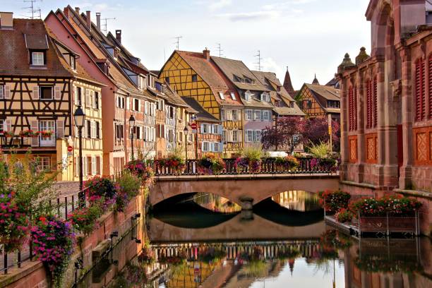 istock Evening view with bridge and canal reflections, Colmar, France 1006721090
