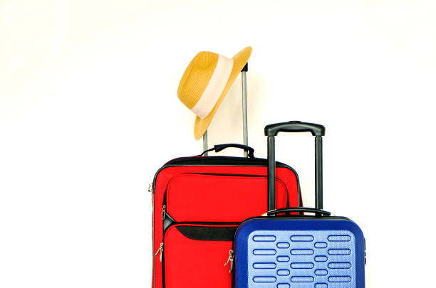 istock Minimalistic composition with suitcase luggage for summer vacation. Travel light concept. 1006738594