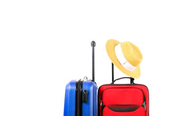istock Minimalistic composition with suitcase luggage for summer vacation. Travel light concept. 1006738792