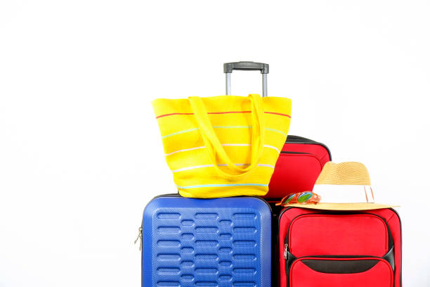 istock Minimalistic composition with suitcase luggage for summer vacation. Travel light concept. 1006738944