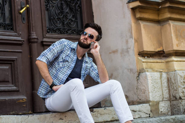 istock Casual Guy With The Phone 1006744236