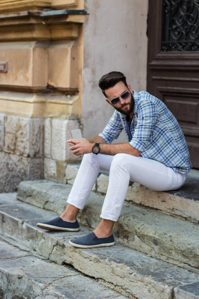 istock Casual Guy With The Phone 1006745634