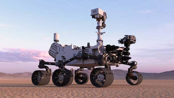 istock Mars Rover, robotic autonomous space vehicle on a deserted planet with hills in background, 3D render 1006754384