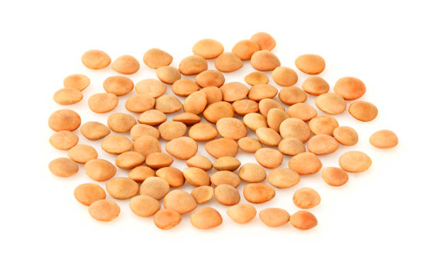 istock Yellow lentils close up isolated 1006755076