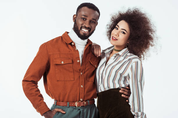 istock happy african american retro styled couple looking at camera isolated on white 1006766964