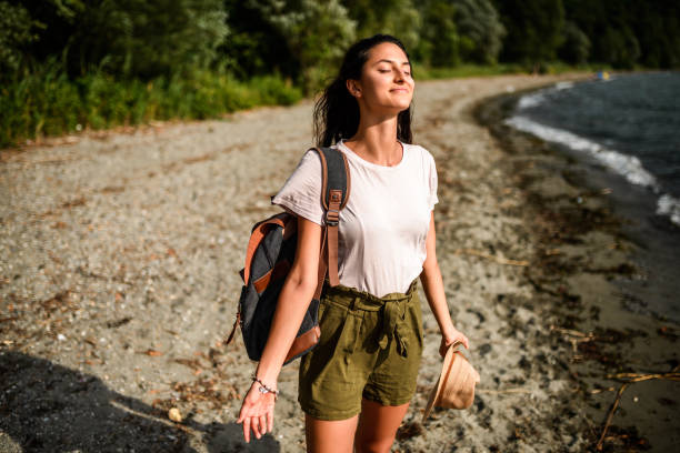 Breathing in. Beautiful hispanic woman enjoying beautiful air of nature exhaling stock pictures, royalty-free photos & images