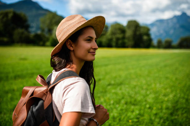 Photo of a woman tourist enjoying in the nature of North Italy.
